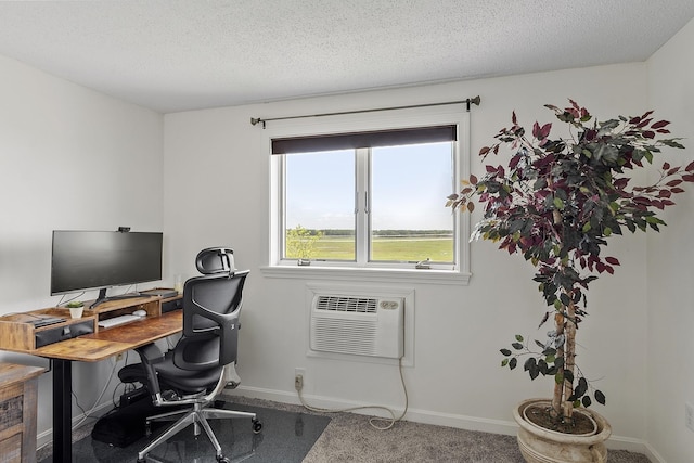 407 Ocean Blvd Unit A11, Hampton, NH 03842 - home office featuring carpet, an AC wall unit, and a textured ceiling