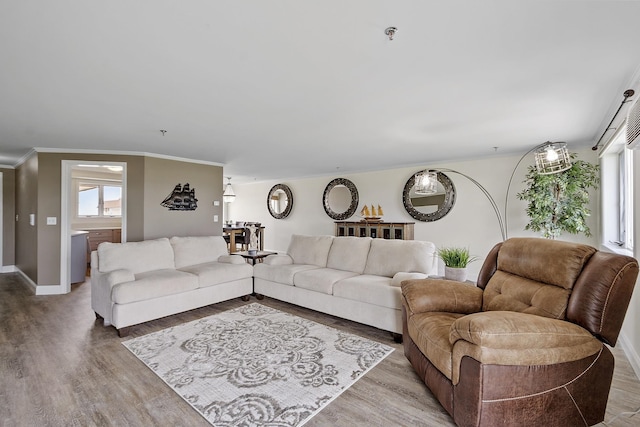 407 Ocean Blvd Unit A11, Hampton, NH 03842 - living room featuring light wood-style floors and crown molding