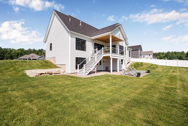 422 Blane Cir Unit 50, Pembroke, NH 03275 - rear view of property featuring stairway, a patio area, a shingled roof, and a deck