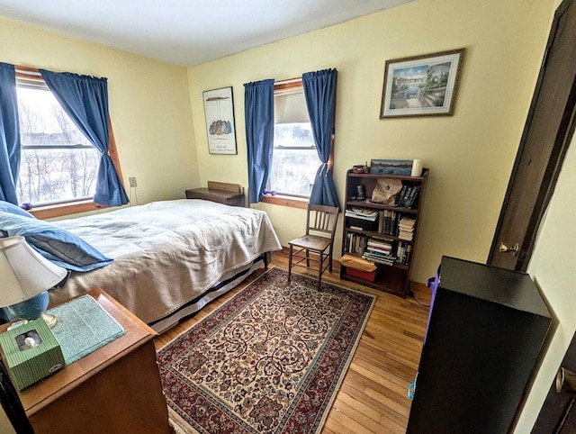 5559 W Creek Rd, Brandon, VT 05733 - bedroom featuring multiple windows and wood finished floors