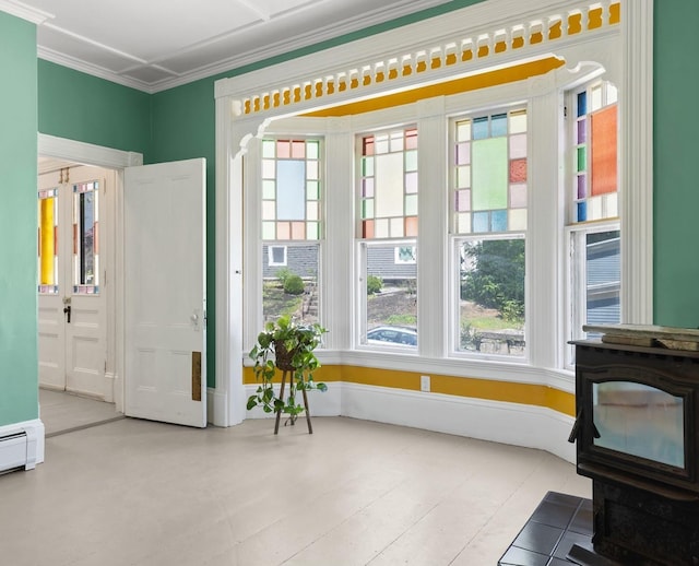 10 Prospect St, Somersworth, NH 03878 - interior space featuring crown molding, a wood stove, and a baseboard radiator