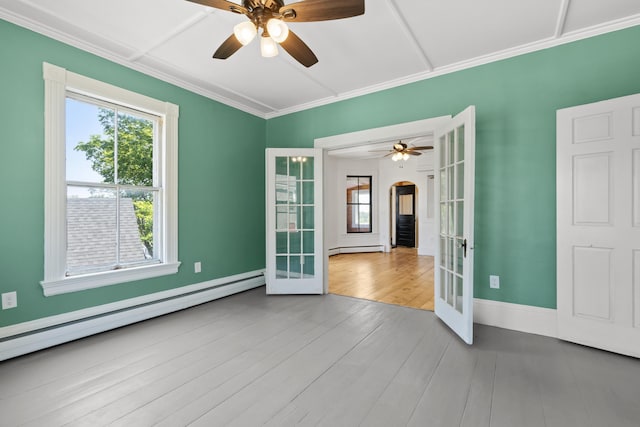 10 Prospect St, Somersworth, NH 03878 - spare room with french doors, baseboard heating, healthy amount of natural light, ceiling fan, and ornamental molding