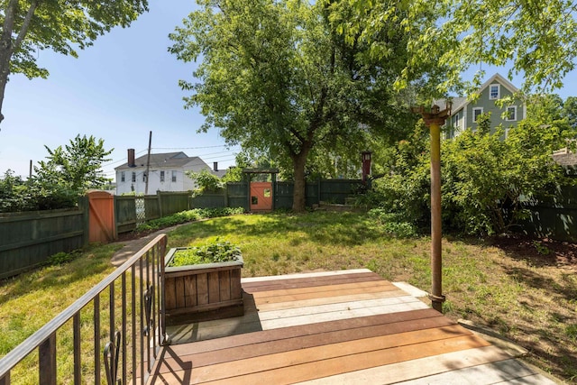 10 Prospect St, Somersworth, NH 03878 - wooden terrace with a fenced backyard