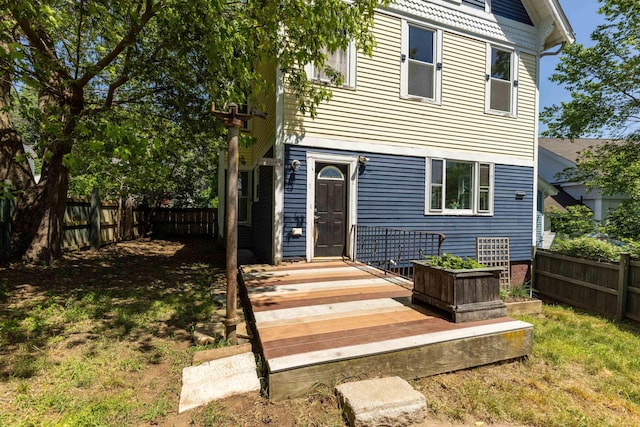 10 Prospect St, Somersworth, NH 03878 - back of property featuring a fenced backyard