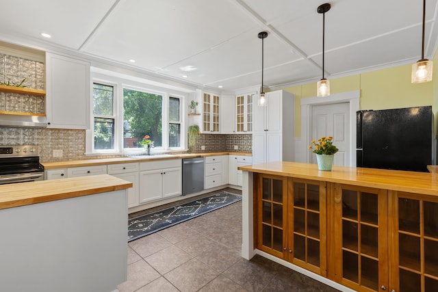 10 Prospect St, Somersworth, NH 03878 - kitchen featuring butcher block countertops, appliances with stainless steel finishes, open shelves, and decorative backsplash