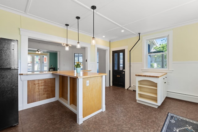 10 Prospect St, Somersworth, NH 03878 - kitchen with wooden counters, freestanding refrigerator, a baseboard radiator, ornamental molding, and recessed lighting