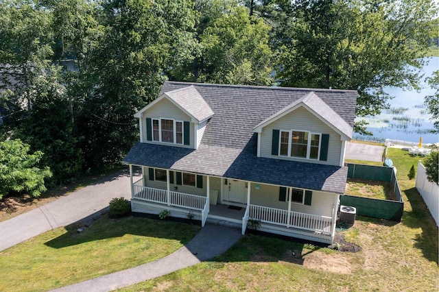 207 Long Pond Rd, Danville, NH 03819 - view of front of property with a porch, roof with shingles, and a front yard