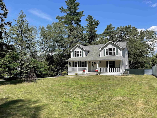 207 Long Pond Rd, Danville, NH 03819 - view of front facade with a porch, a shingled roof, and view of wooded area