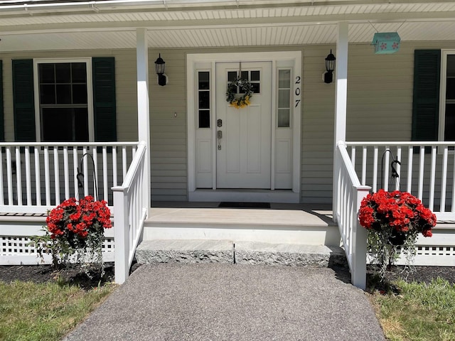 207 Long Pond Rd, Danville, NH 03819 - property entrance featuring covered porch