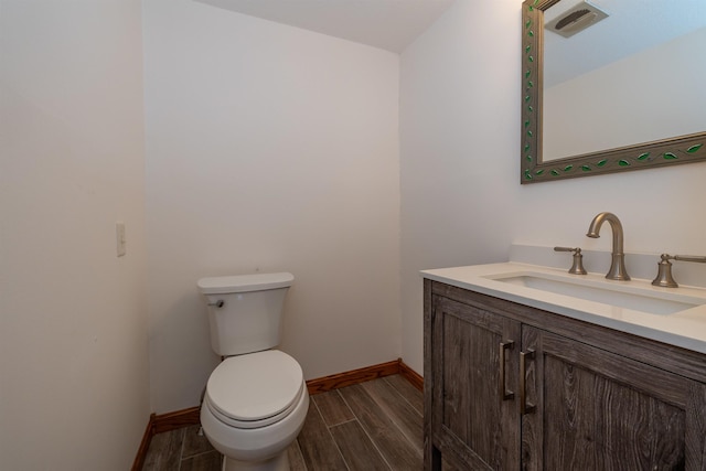4B Pine Isle Dr Unit B, Derry, NH 03038 - half bathroom featuring vanity and wood finished floors