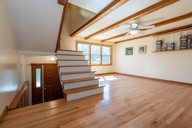 4B Pine Isle Dr Unit B, Derry, NH 03038 - stairway featuring wood finished floors, beam ceiling, and a ceiling fan