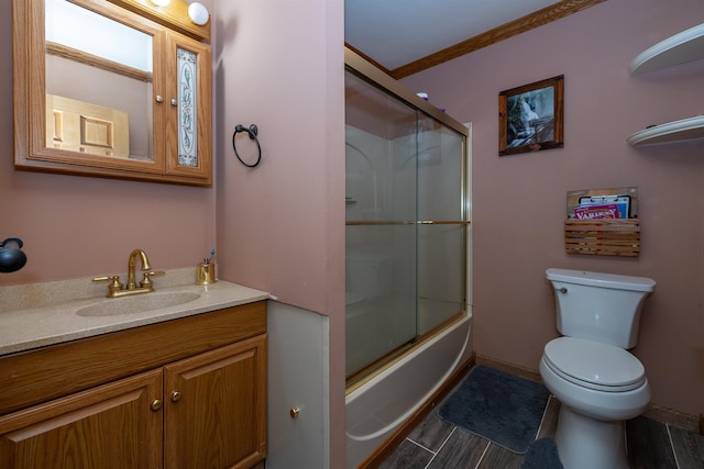 4B Pine Isle Dr Unit B, Derry, NH 03038 - bathroom featuring vanity, enclosed tub / shower combo, and wood finished floors