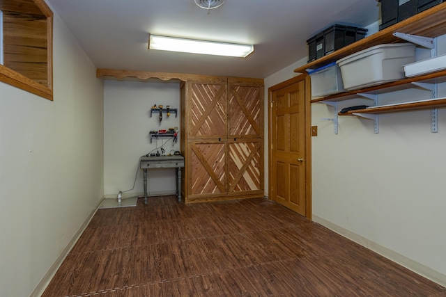 4B Pine Isle Dr Unit B, Derry, NH 03038 - below grade area featuring wood finished floors and baseboards