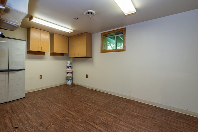 4B Pine Isle Dr Unit B, Derry, NH 03038 - basement featuring dark wood finished floors and baseboards