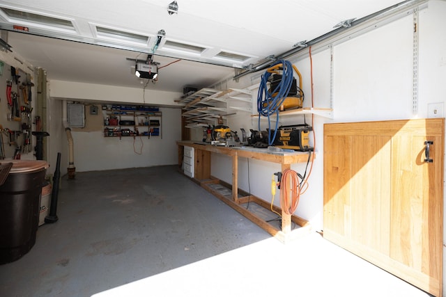 4B Pine Isle Dr Unit B, Derry, NH 03038 - garage with a workshop area, a garage door opener, and electric panel