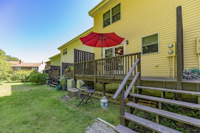 4B Pine Isle Dr Unit B, Derry, NH 03038 - rear view of house featuring a deck, a lawn, and stairway