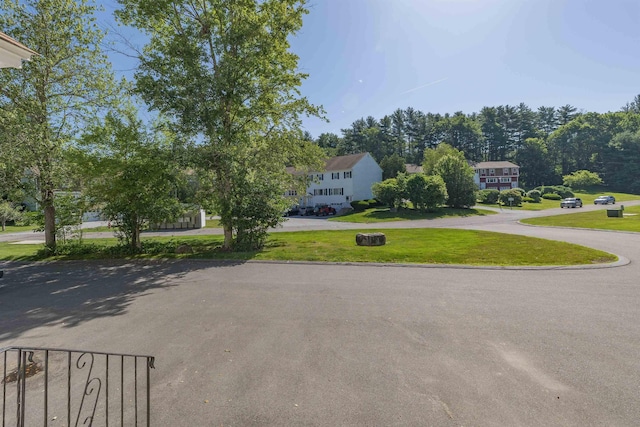 4B Pine Isle Dr Unit B, Derry, NH 03038 - view of front facade featuring a front yard