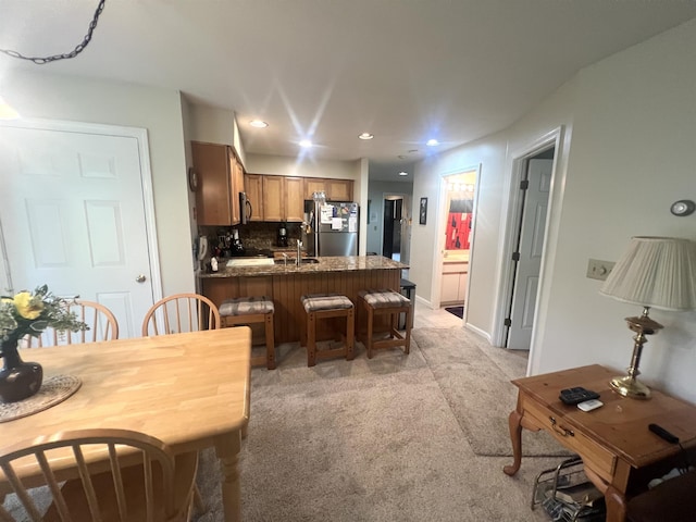 8B Deer Crk, Dover, VT 05356 - dining room with light colored carpet and recessed lighting