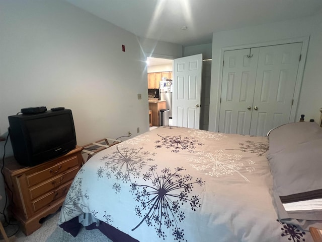 8B Deer Crk, Dover, VT 05356 - bedroom with a closet and freestanding refrigerator