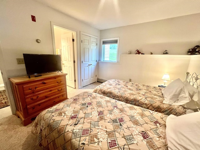 8B Deer Crk, Dover, VT 05356 - bedroom featuring light carpet and baseboard heating