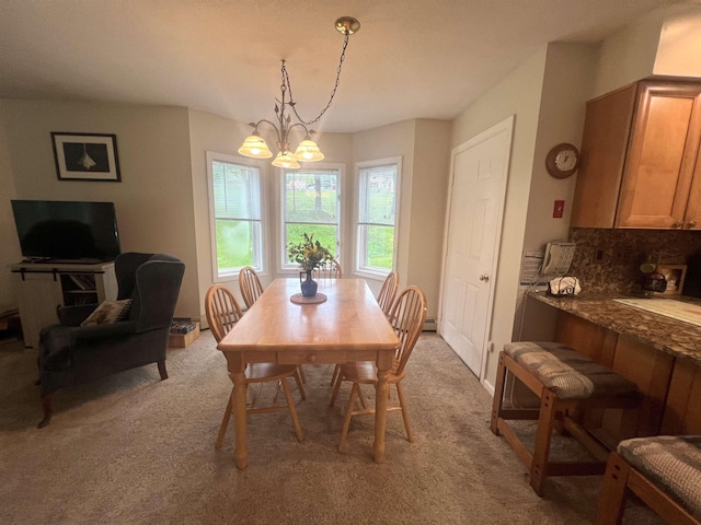 8B Deer Crk, Dover, VT 05356 - dining room featuring light carpet and a chandelier