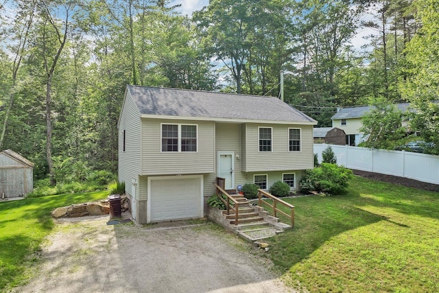 16 Damsite Rd, Barnstead, NH 03225 - bi-level home featuring driveway, an attached garage, and a shingled roof