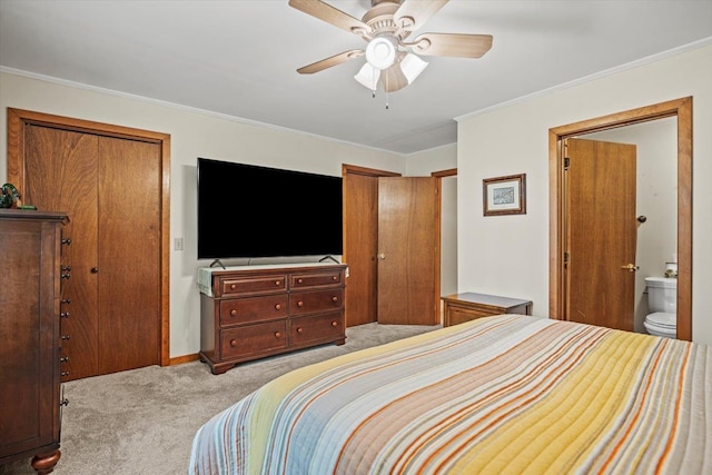 79 Dunvegan Woods Dr Unit 79, Hampton, NH 03842 - carpeted bedroom featuring crown molding, ceiling fan, multiple closets, and ensuite bath