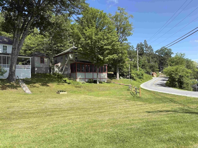 1056 Point Of Pines Rd, Castleton, VT 05735 - view of green lawn with a sunroom