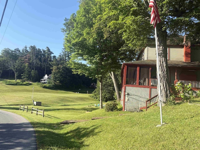 1056 Point Of Pines Rd, Castleton, VT 05735 - view of grassy yard featuring a sunroom