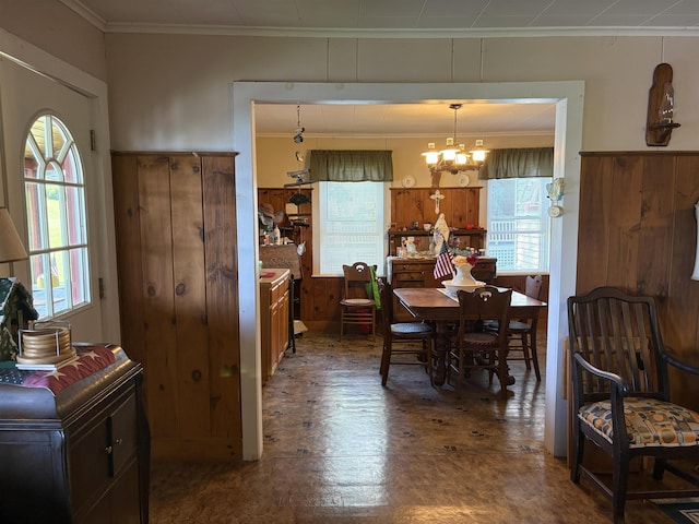 1056 Point Of Pines Rd, Castleton, VT 05735 - dining space featuring crown molding, a chandelier, and wood finished floors