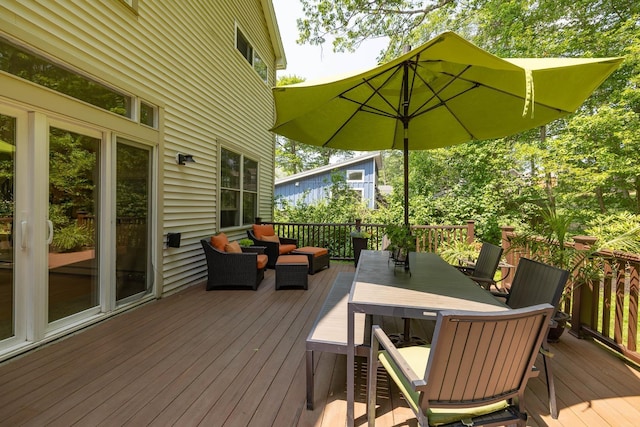 201 Walker Bungalow Rd, Portsmouth, NH 03801 - wooden deck with outdoor dining space and an outdoor living space