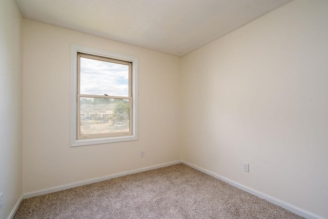 129 Fisherville Rd Unit 26, Concord, NH 03303 - carpeted empty room with baseboards