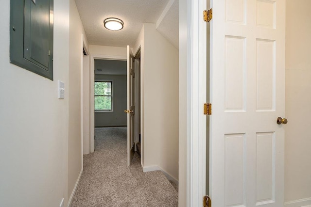 129 Fisherville Rd Unit 26, Concord, NH 03303 - corridor with light carpet and electric panel