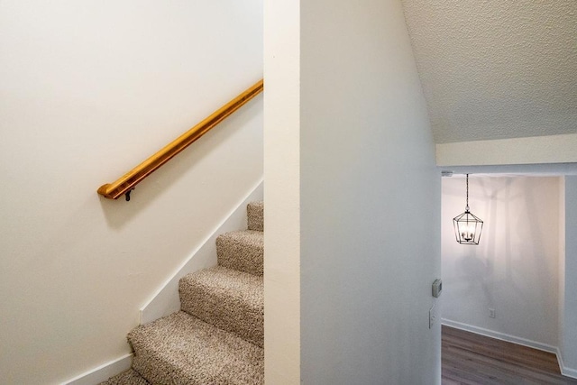 129 Fisherville Rd Unit 26, Concord, NH 03303 - staircase with wood finished floors and lofted ceiling