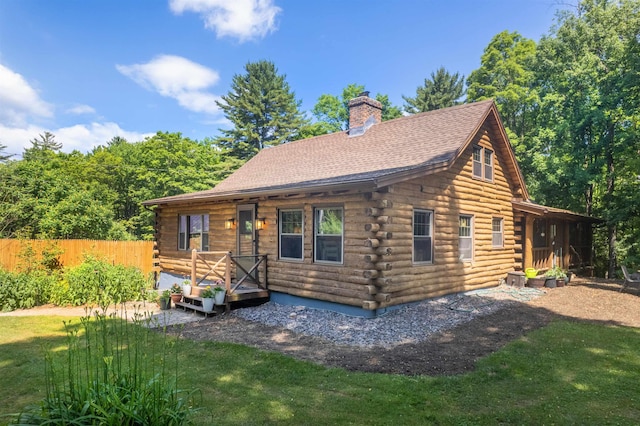30 W Rd, Hubbardton, VT 05743 - log-style house featuring log siding, a chimney, and a shingled roof