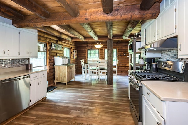 30 W Rd, Hubbardton, VT 05743 - kitchen featuring appliances with stainless steel finishes, log walls, a wooden ceiling with exposed beams, dark wood-style floors, and healthy amount of natural light