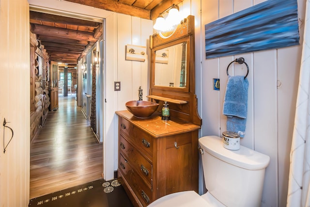 30 W Rd, Hubbardton, VT 05743 - bathroom with vanity, wood finished floors, and a wooden ceiling with exposed beams