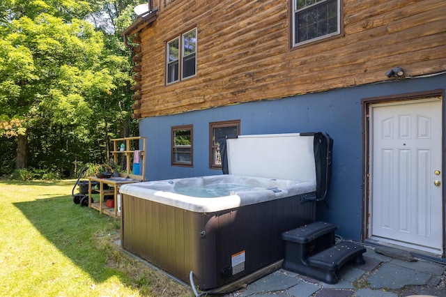 30 W Rd, Hubbardton, VT 05743 - exterior space featuring a hot tub, log exterior, and a lawn