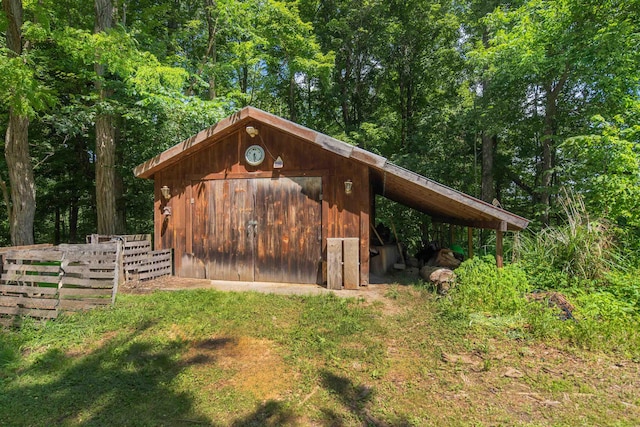 30 W Rd, Hubbardton, VT 05743 - view of outdoor structure with a wooded view