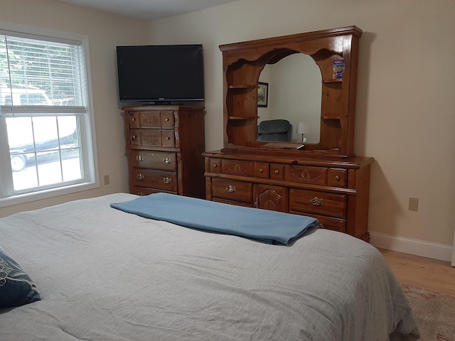 11 Captain Lovewell Ln, Ossipee, NH 03814 - bedroom with baseboards and light wood-type flooring