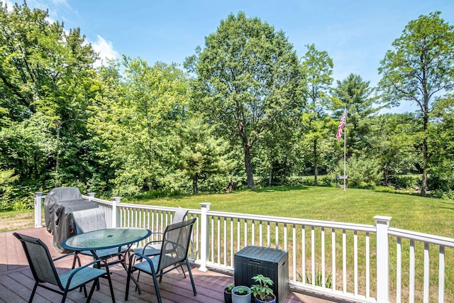 11 Captain Lovewell Ln, Ossipee, NH 03814 - wooden deck featuring outdoor dining area and a yard