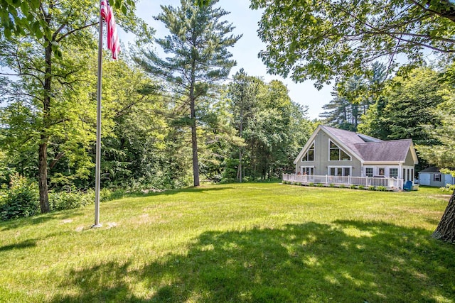 11 Captain Lovewell Ln, Ossipee, NH 03814 - view of grassy yard featuring a deck