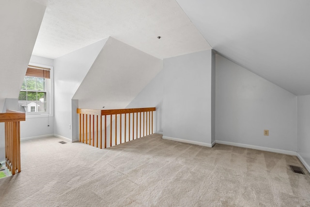 33 Beech Hill Ave, Manchester, NH 03103 - additional living space with carpet floors and lofted ceiling