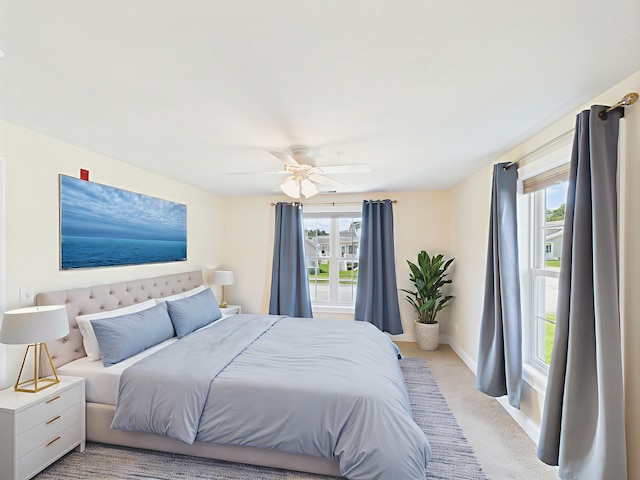 6 Stearns Ln Unit 103, Merrimack, NH 03054 - bedroom featuring multiple windows, light colored carpet, and a ceiling fan