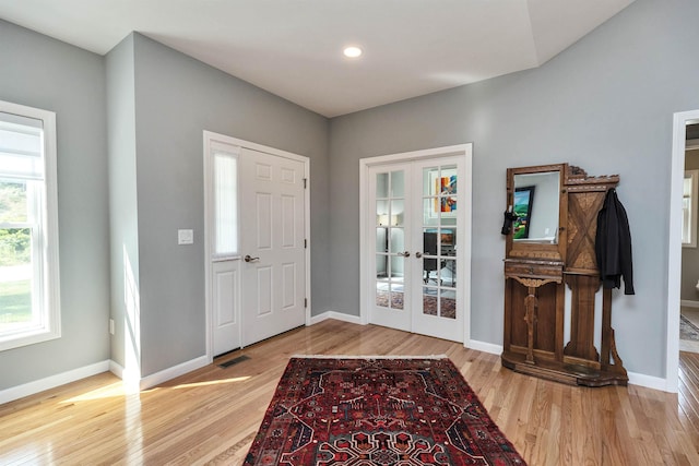 25 Reserve Way Unit 60, Milford, NH 03055 - foyer with french doors, wood finished floors, and recessed lighting