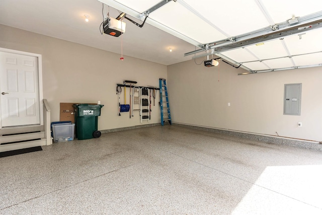 25 Reserve Way Unit 60, Milford, NH 03055 - garage featuring electric panel and a garage door opener