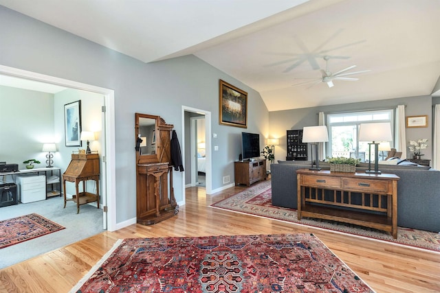 25 Reserve Way Unit 60, Milford, NH 03055 - living room with ceiling fan, wood finished floors, and vaulted ceiling