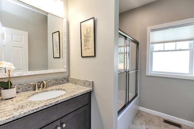 25 Reserve Way Unit 60, Milford, NH 03055 - full bathroom featuring vanity, enclosed tub / shower combo, and tile patterned flooring