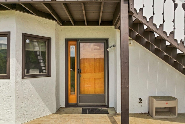 F22 Christmas Mountain Rd Unit 22, Bartlett, NH 03812 - doorway to property featuring stucco siding