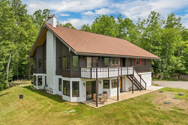 F22 Christmas Mountain Rd Unit 22, Bartlett, NH 03812 - rear view of property with a patio, stairway, a chimney, and a lawn